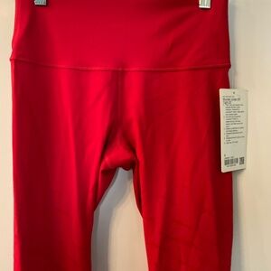 Never worn Lunar New Year Wunder Under 25” HR leggings size 8 dark red